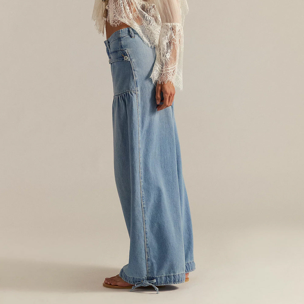 Side view of woman waring light blue relaxed wide-leg jeans