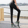 Model wearing black SizeShift high-waist pocket leggings