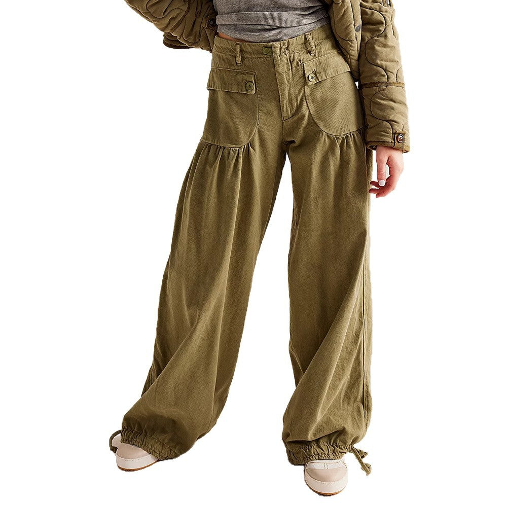Woman wearing olive relaxed denim jeans with elastic cuffs