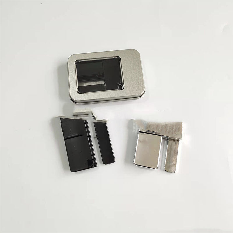 Black, silver, and white no-sew waistband tightening clips
